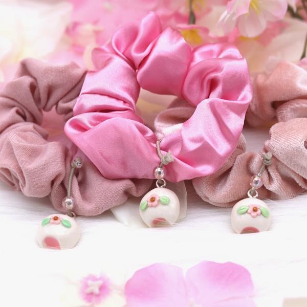 https://kawaiicraftshop.com/cdn/shop/products/Sakura-Mochi-Clay-Charm-Closeup_grande.png?v=1616034301